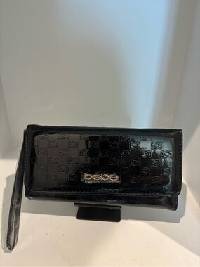 bebe Glossy Black Patent Wristlet  with Logo Plaque